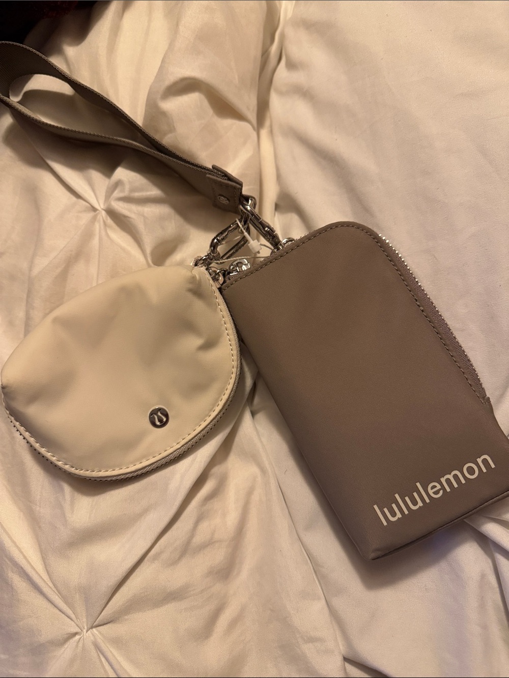 Lululemon Dual Wristlet in light olive/cream color